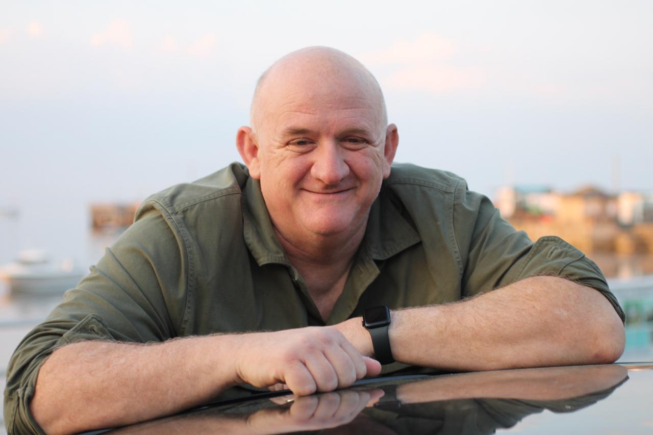 Clinton Pearce, DVSA Approved driving instructor in Poole, smiling by Poole Harbour
